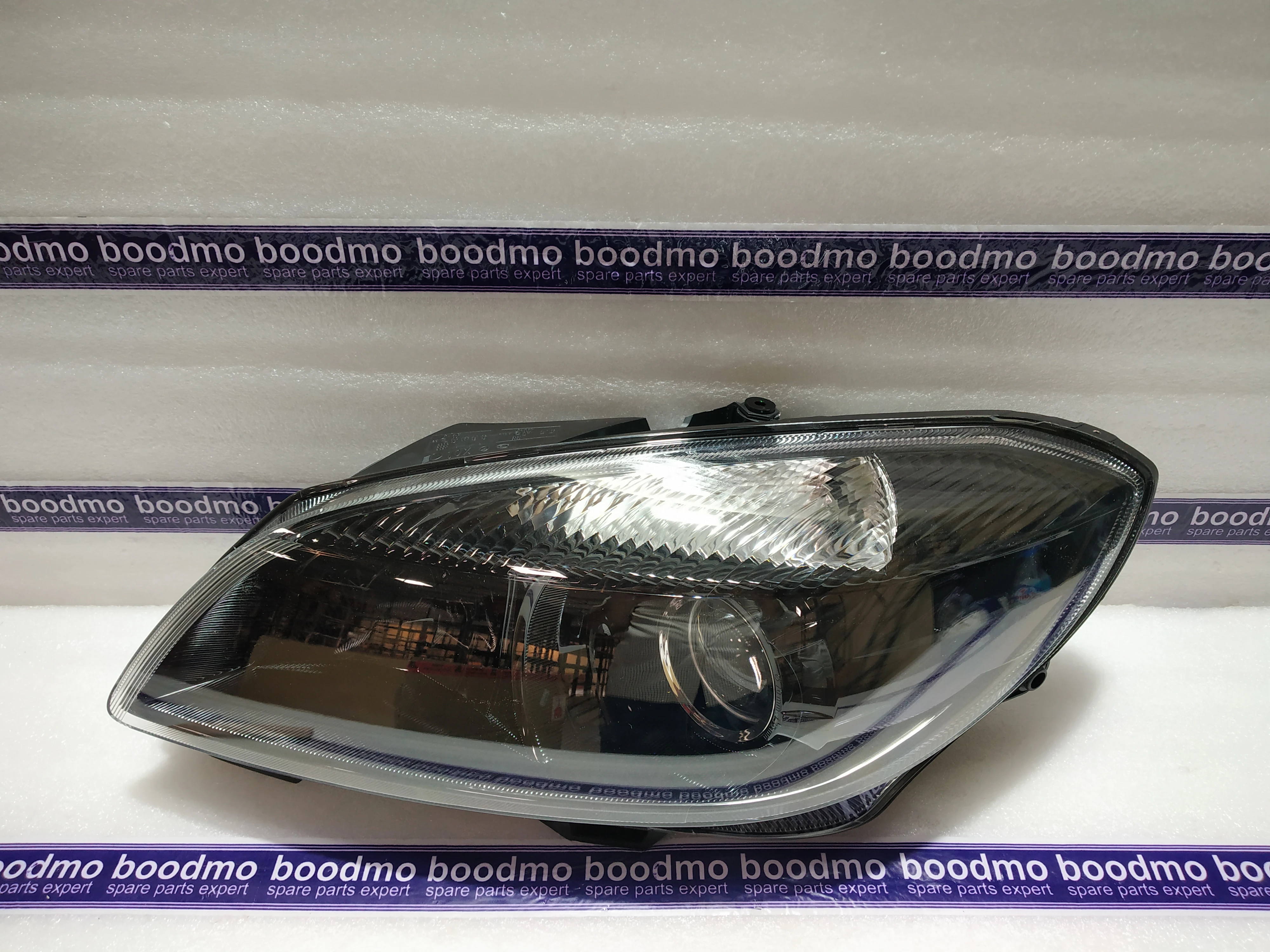 Skoda rapid shop 2012 headlight