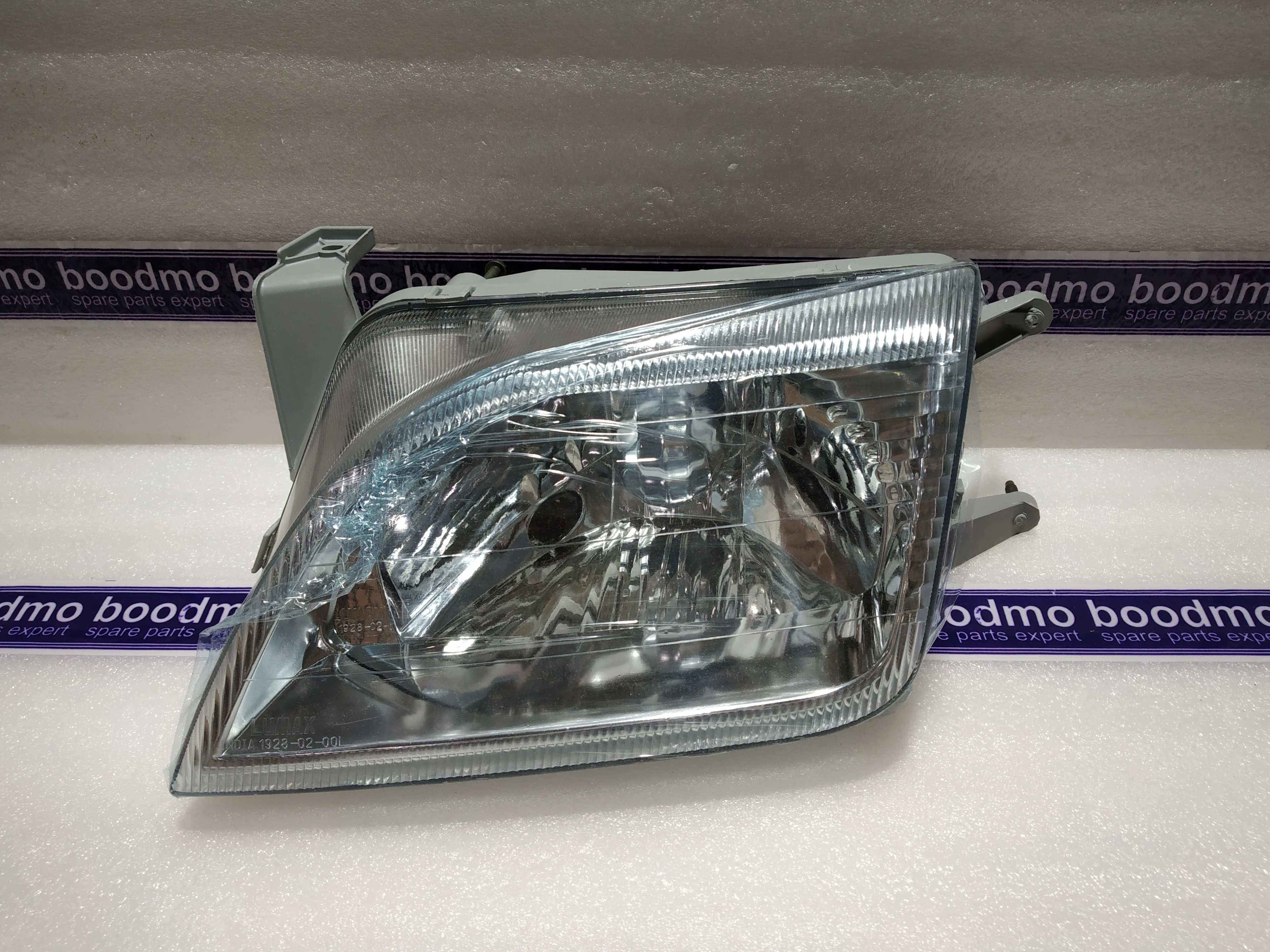 Esteem car deals headlight assembly price